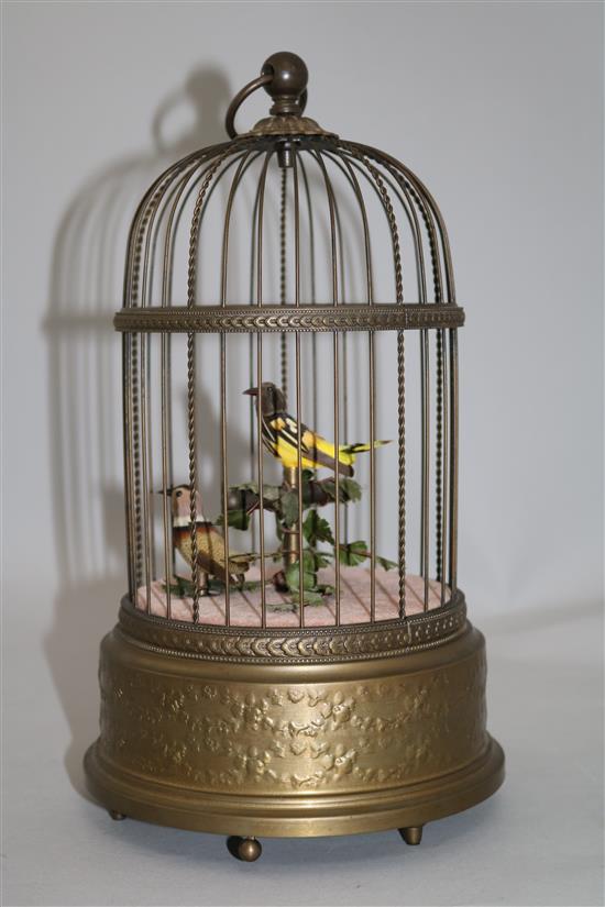 A mid 20th century musical brass birdcage automaton by Reuge Music, Saint-Croix, Switzerland, 11.25in.